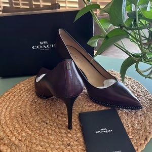 9 1/2  warm oxblood  Coach pumps
